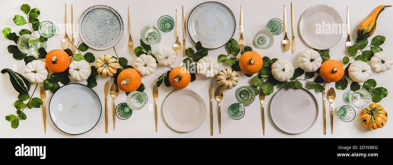 Fall table setting for celebration Autumn holiday with pumpkins Stock Photo