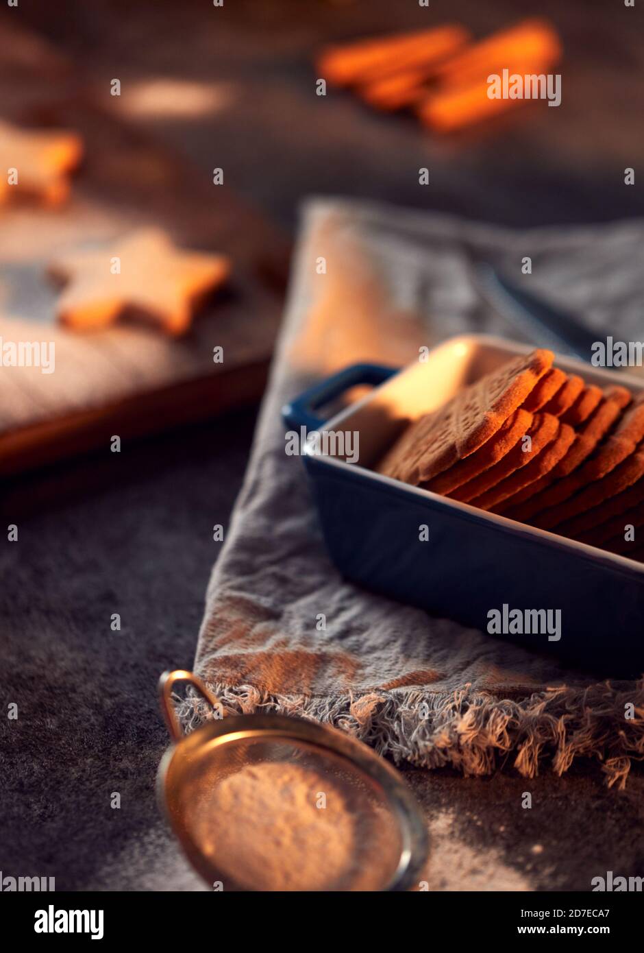 Freshly Baked Christmas Cookies On Board Ready For Decoration Stock Photo