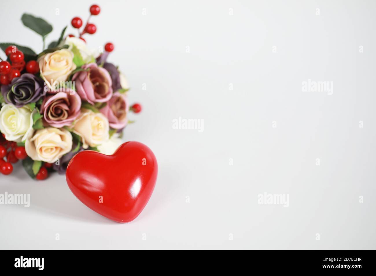 Bouquet of flowers on a white background and a figure in the shape of a ...