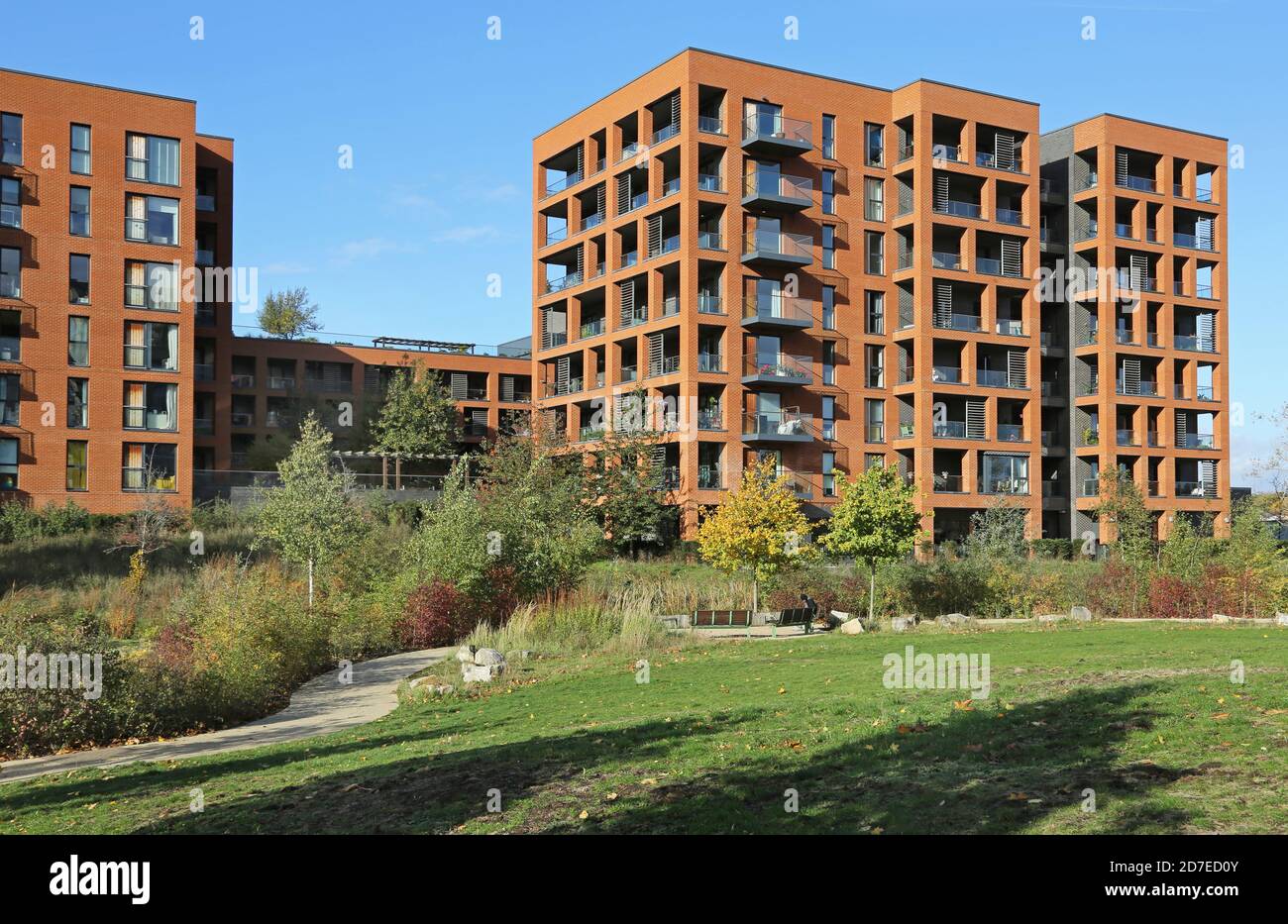 Halton Court, a new apartment block at Kidbrooke Village, a huge new residential development in Greenwich, London UK. Shows Cator Park in foreground. Stock Photo