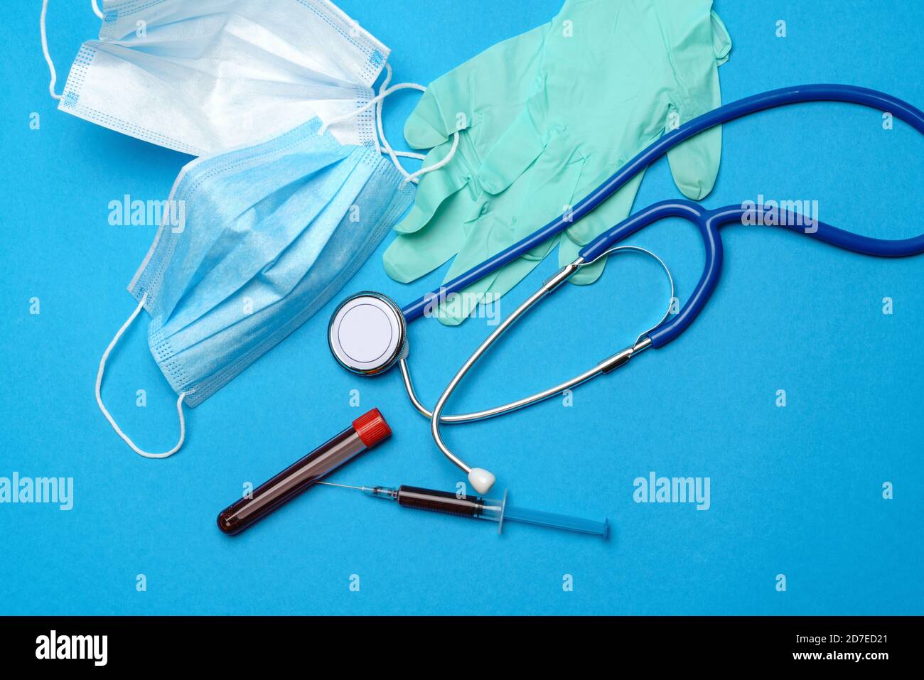 Top view of Medical equipment and tools on blue background ...