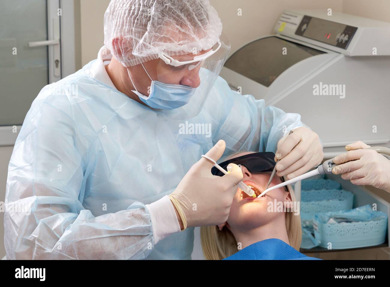 Dentist making local anesthesia shot before surgery Stock Photo Alamy