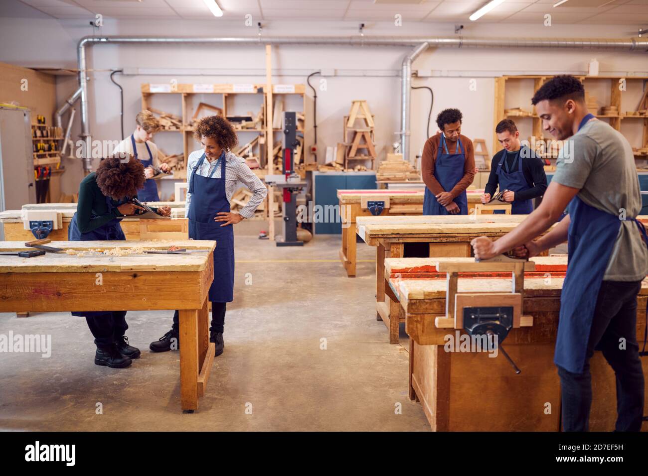 Wide Angle View Of Carpentry Workshop With Students Studying For ...