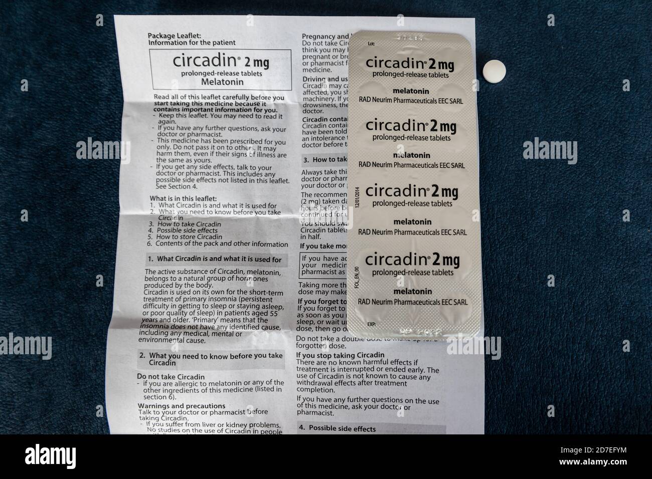 A blister pack of circadin prolonged-release tablets containing the hormone melatonin for insomnia and sleep disorders with information leaflet Stock Photo