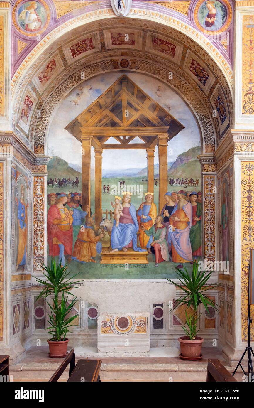 Adoration of the Magi by Perugino in a church Stock Photo