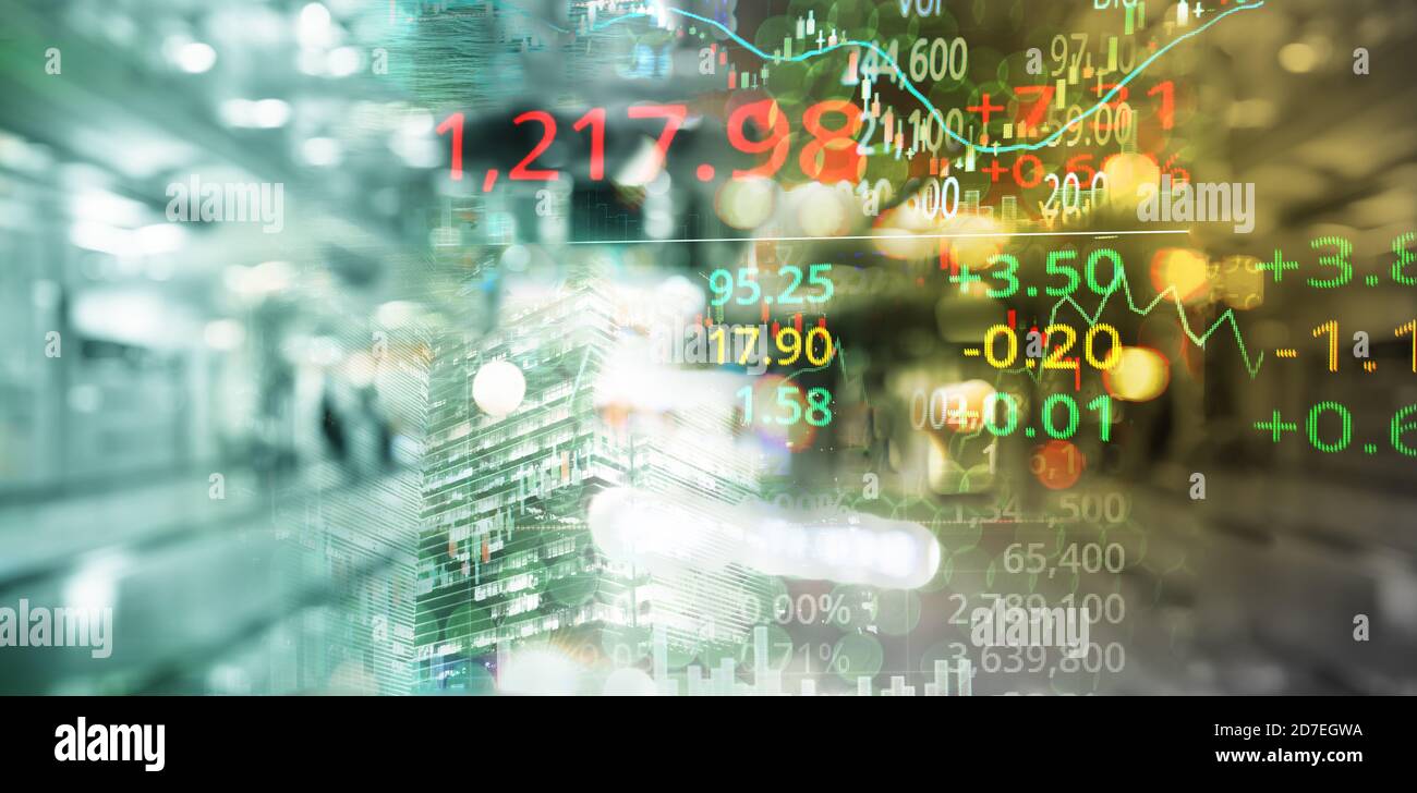 graph line of trade stock market and red green index number on glow blur city light banner business background Stock Photo