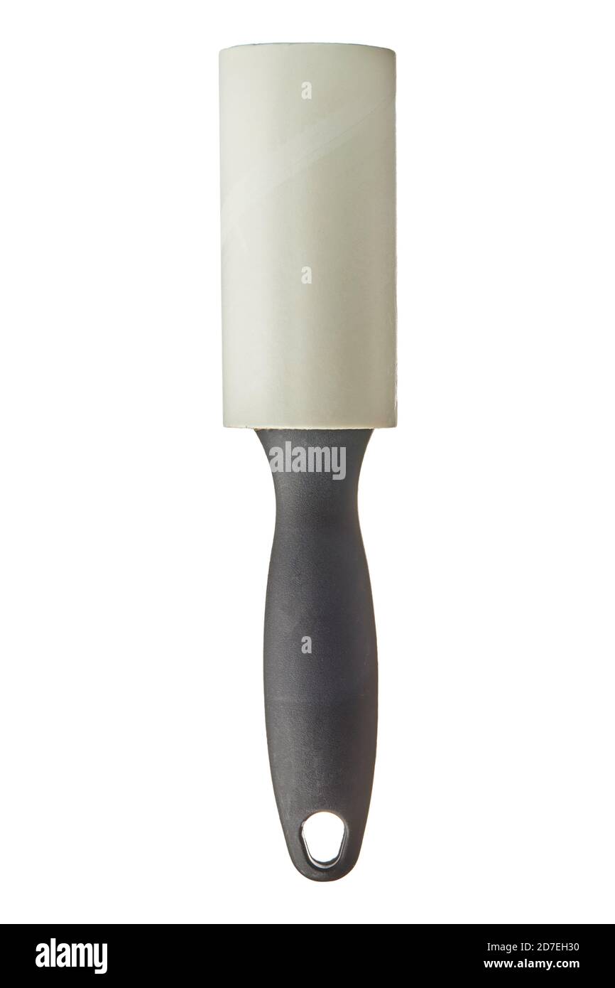 Special white lint roller for cleaning clothes on a white isolate background. Stock Photo