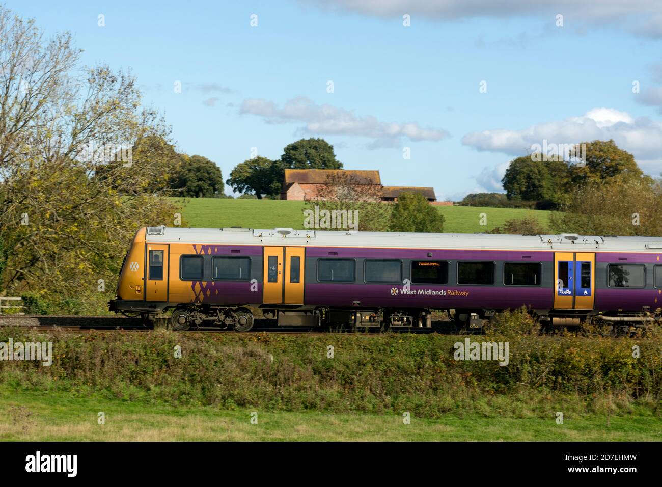 West Midlands Railway class 172 diesel train in Warwickshire countryside in autumn, UK Stock Photo