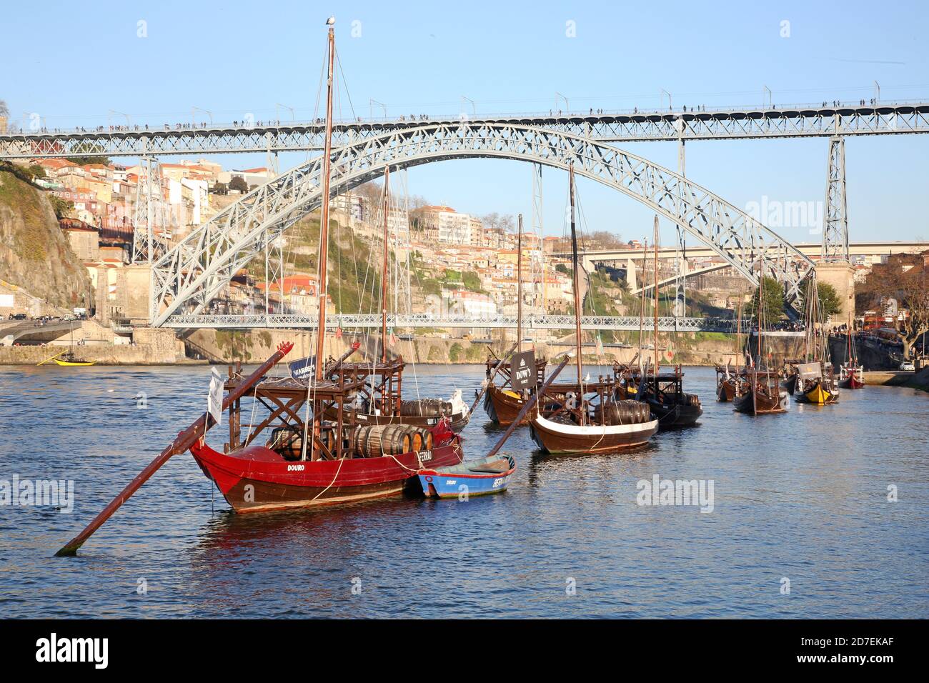 Old boats and bridge in Porto Stock Photo