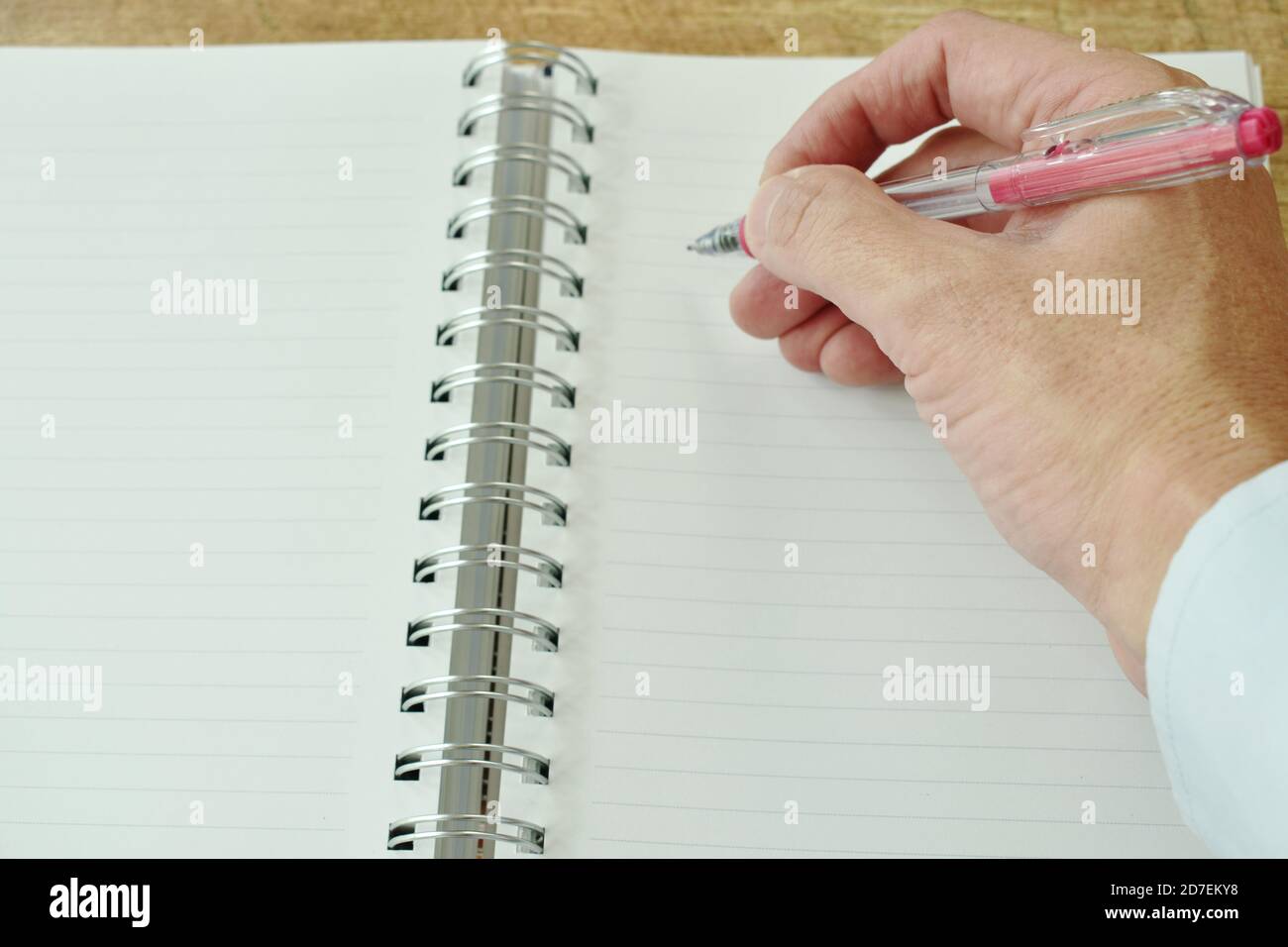 hand writing on white paper book binding Stock Photo