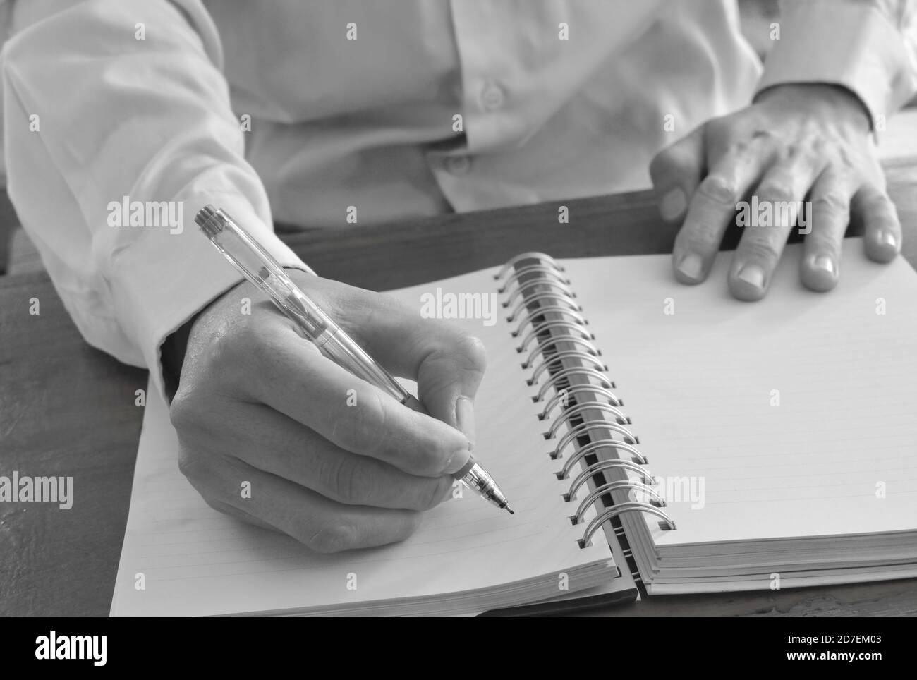 hand writing on white paper book binding Stock Photo Alamy
