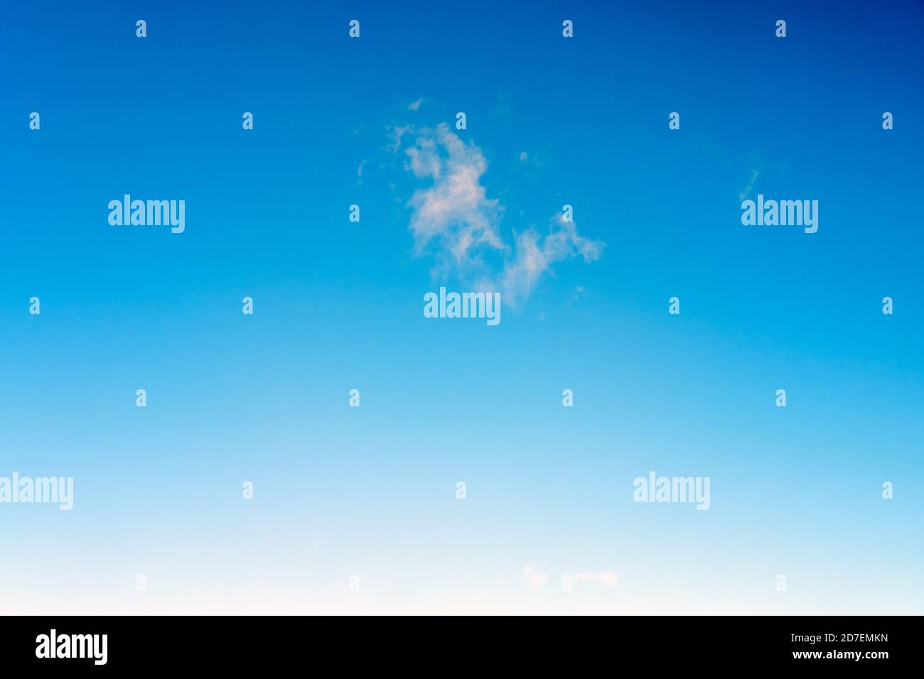 Small cloud in the blue sky, background, copy space for text Stock Photo