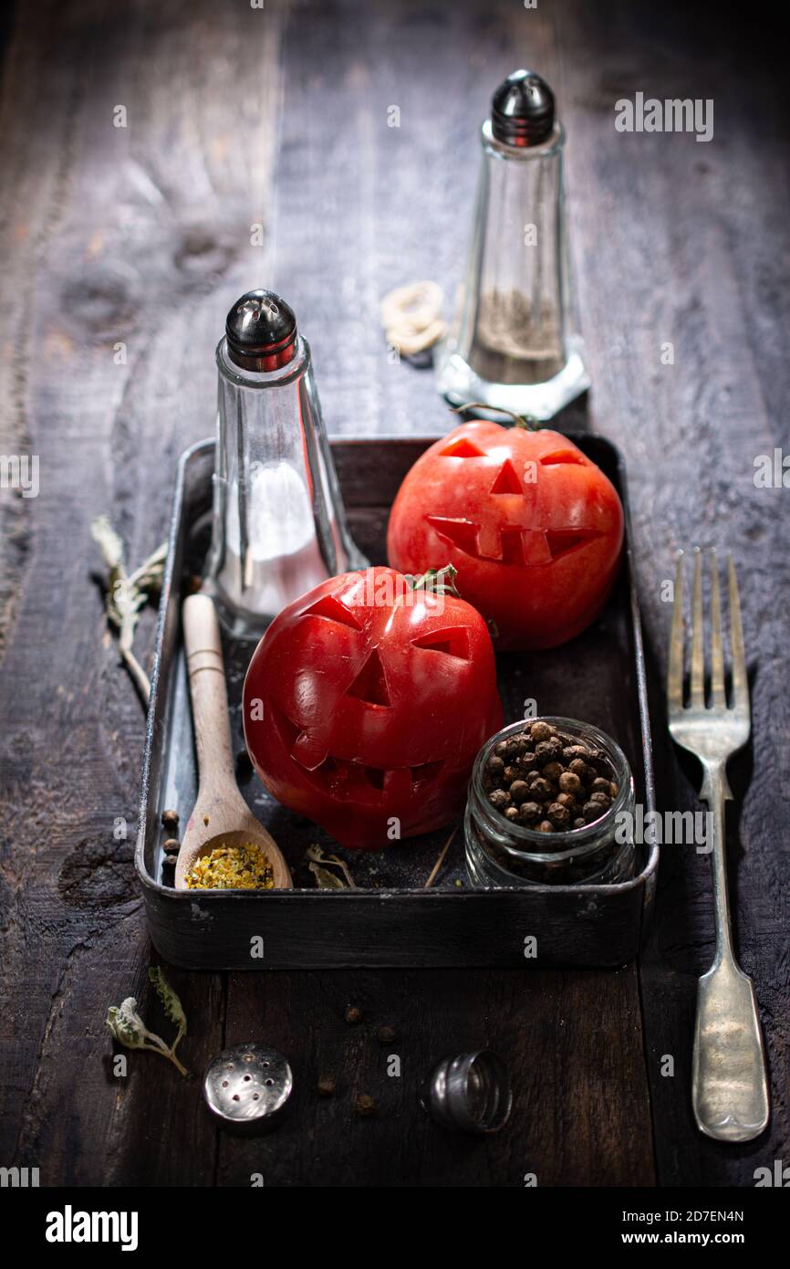 Halloween tomato salad.Healthy vegetables.Sweet food and drink. Stock Photo