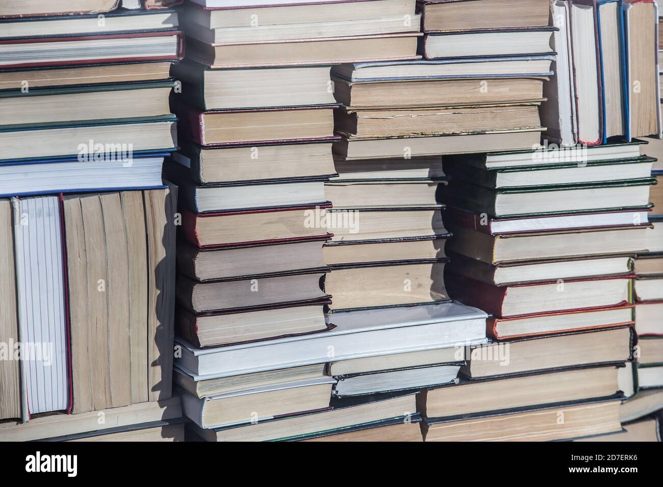 lots of books in abstract stacks. Close-up, background Stock Photo