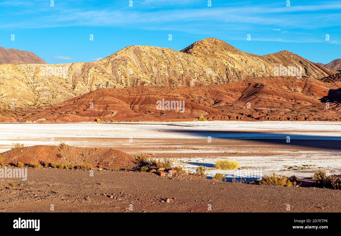 Andes mountains and salt flat at sunset, Uyuni, Bolivia. Stock Photo