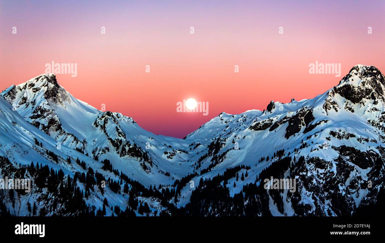 Sunrise in the Winter in Alpine Mountain Landscape Stock Photo