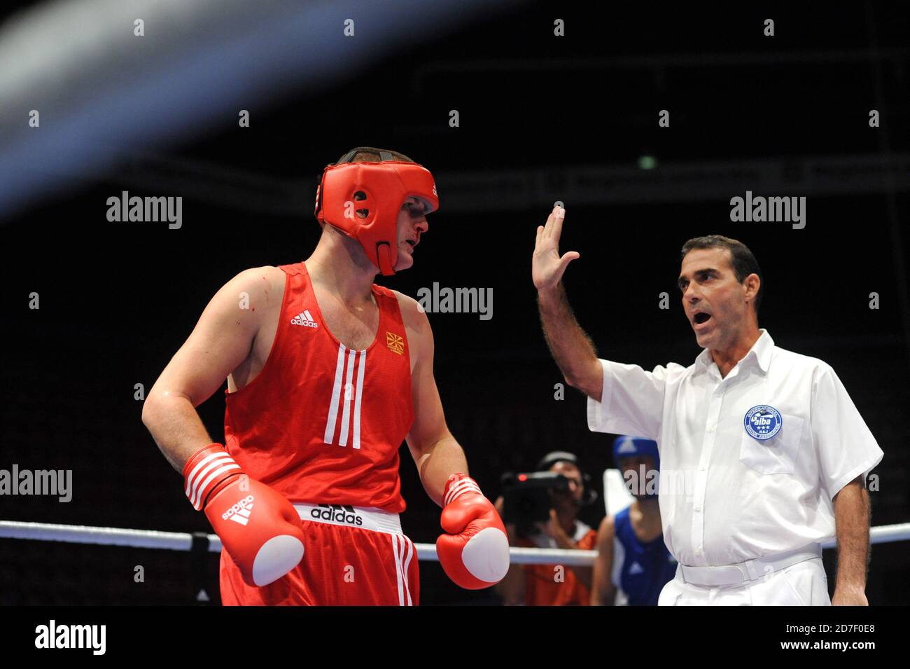 Referee and boxers during an amateur boxe match during the AIBA World