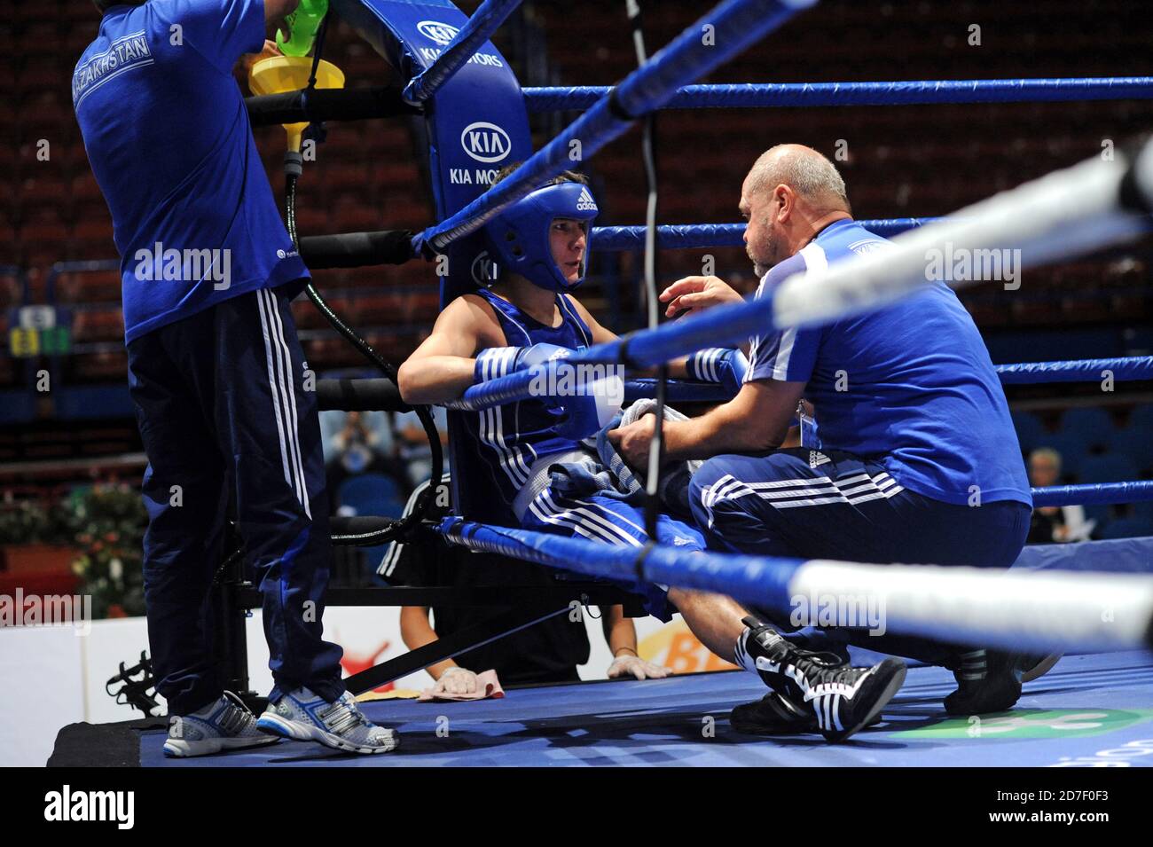 Boxer and coach at the corner ring, duirng an amateur boxing match