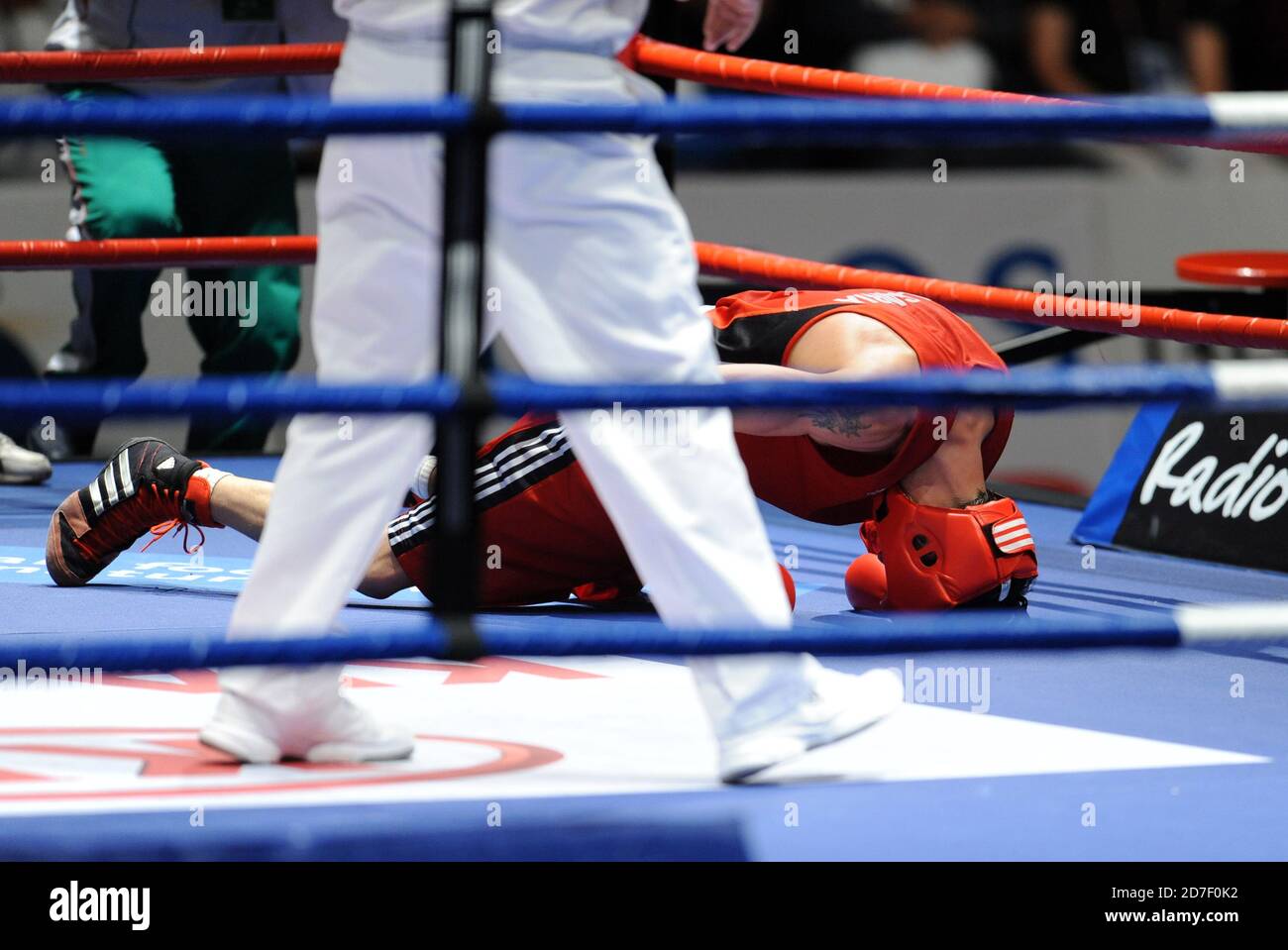 Boxer knock out, during an amateur boxing match during the AIBA World Boxing Champioship in Milan 2009. Stock Photo