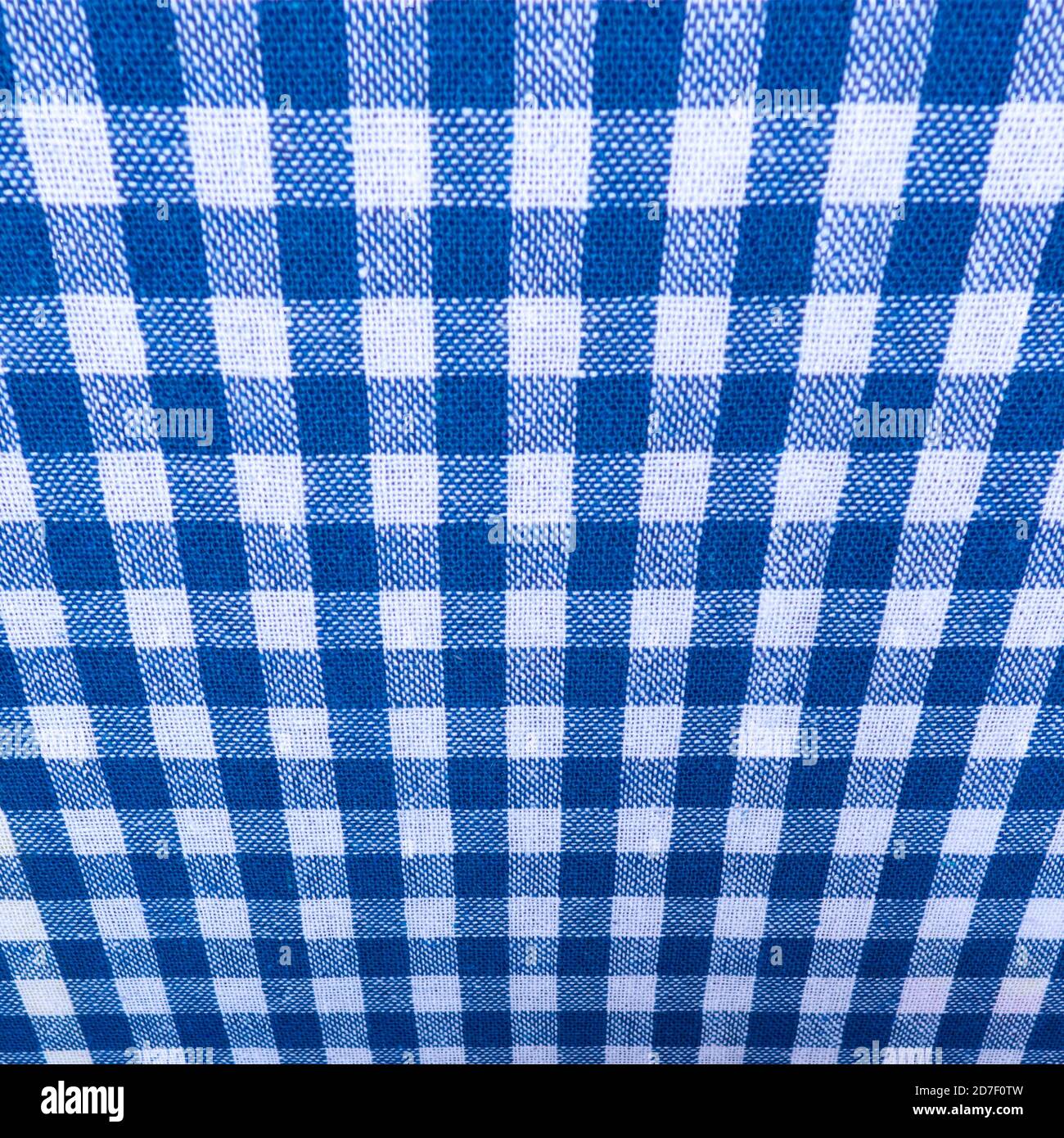 Close up of blue and white cross pattern and texture, as distorted chess table. blue and white chess table. Stock Photo