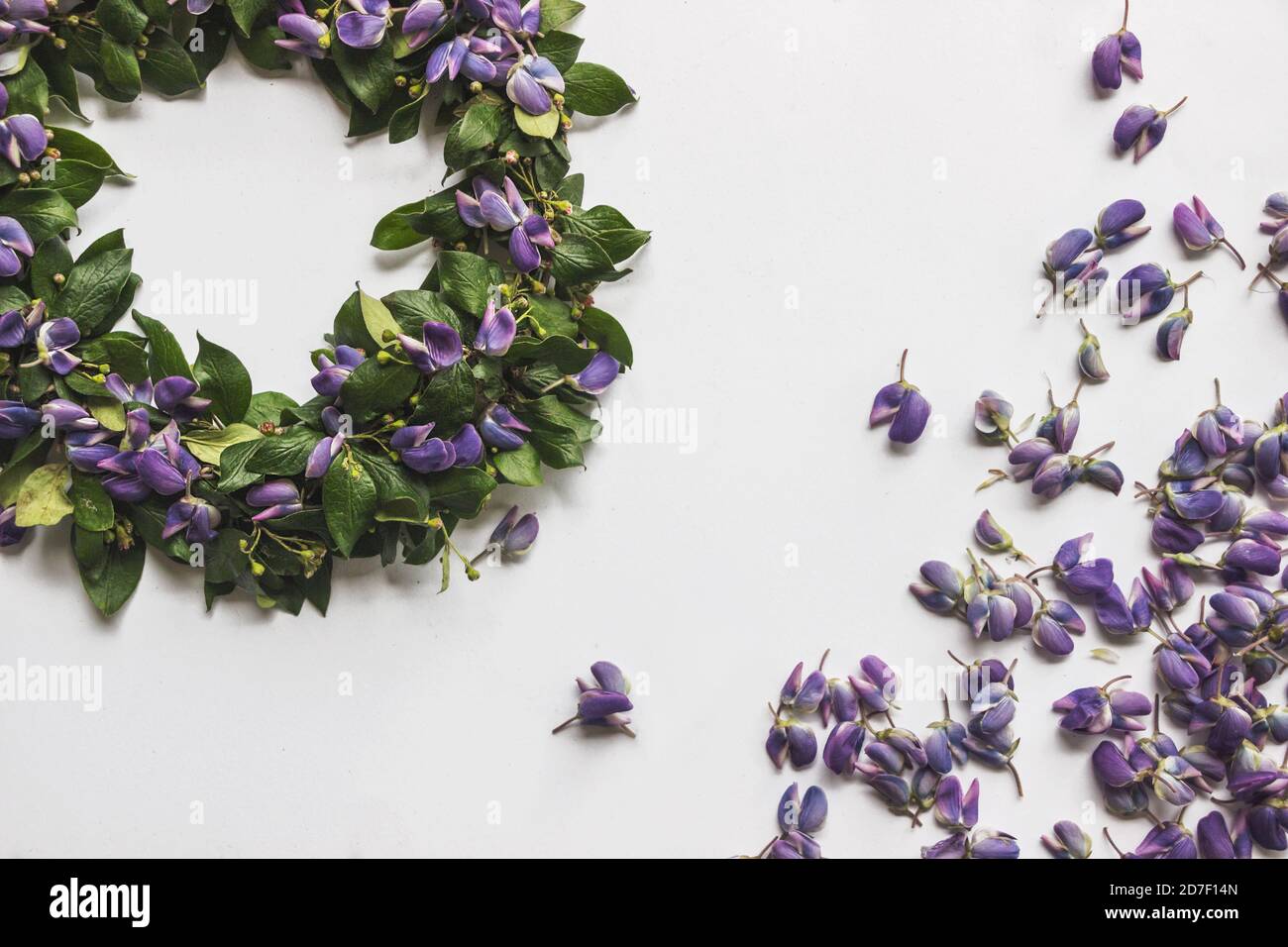 DIY midsummer flower wreath flat lay on white background Stock Photo