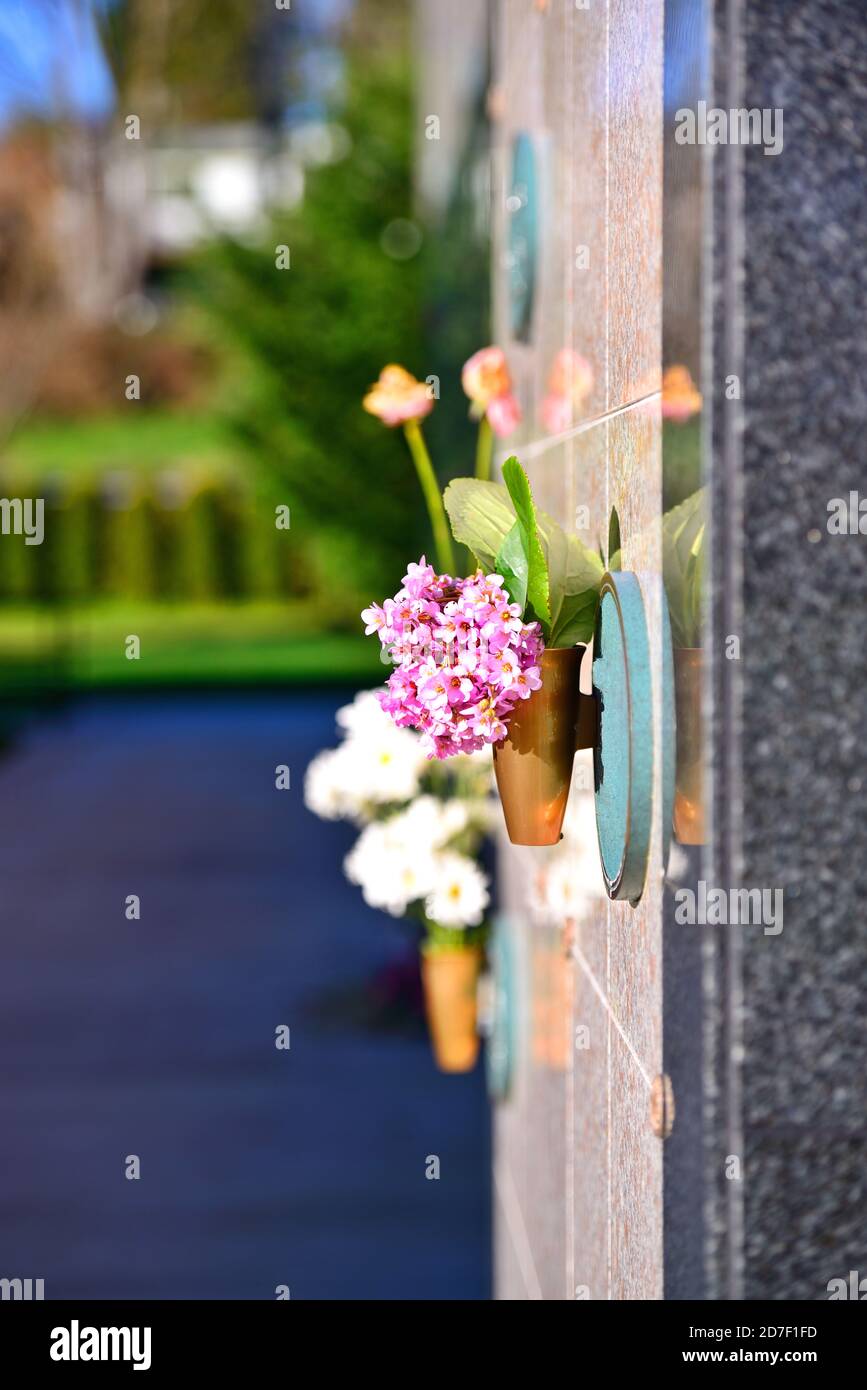 Flowers in a vase on the mausoleum wall Stock Photo Alamy