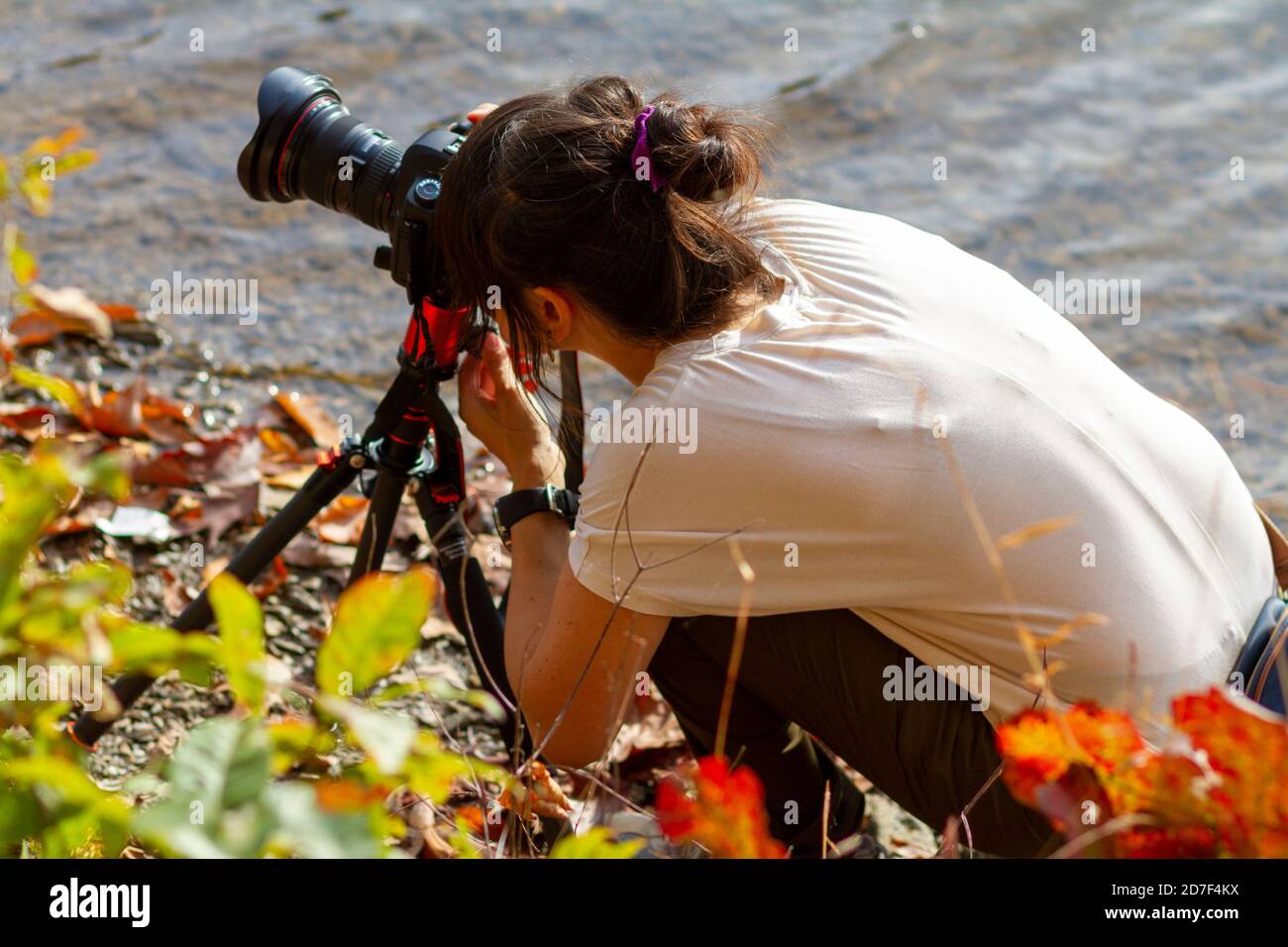 Woman kneeling water hi-res stock photography and images - Alamy