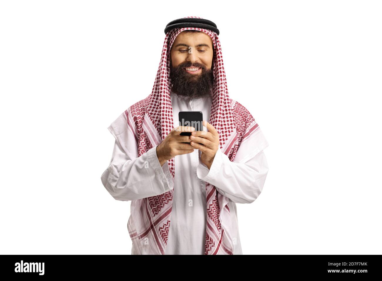 Arab man typing on a smartphone isolated on white background Stock Photo