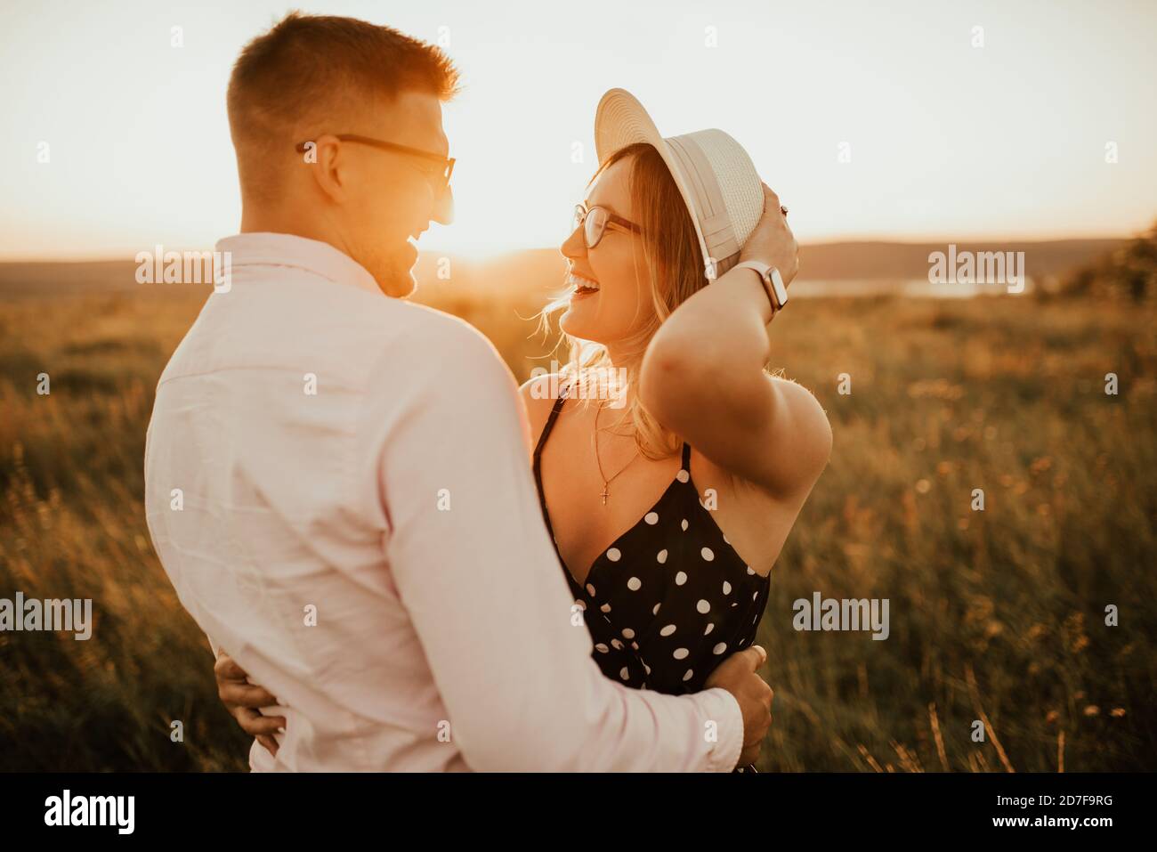 Man woman hug kiss in hi-res stock photography and images - Alamy