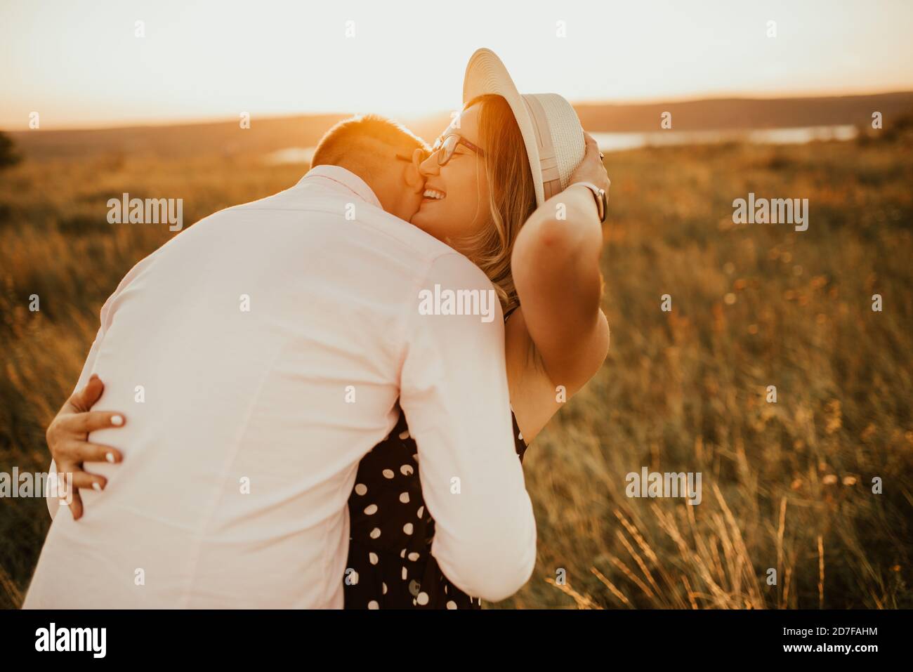 Tall woman kiss hi-res stock photography and images - Alamy