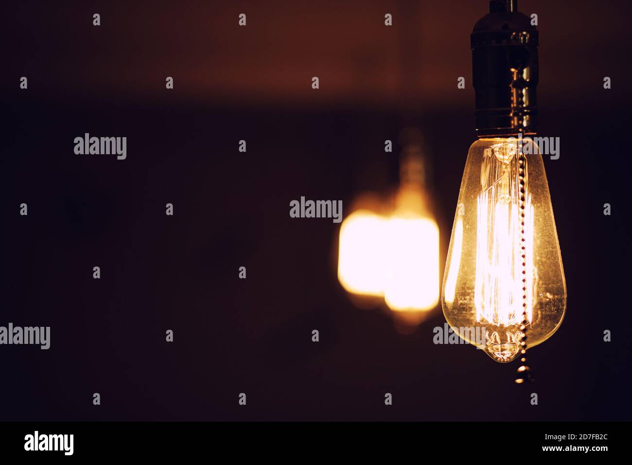 Lamps with tungsten filament. Edison light bulb. Filament filament in