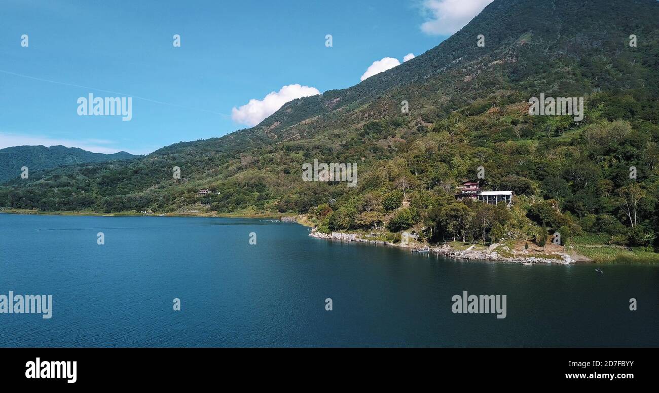 Beautiful view of the famous Lake Atitlan, Guatemala on a blue sky