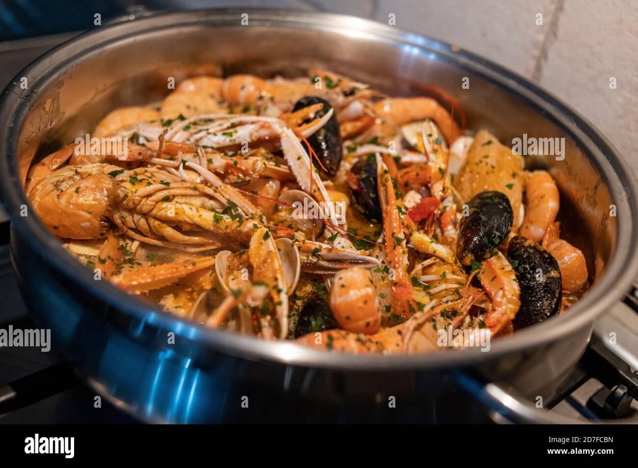 fresh fish soup with scampi and seafood with clams and mussels Stock