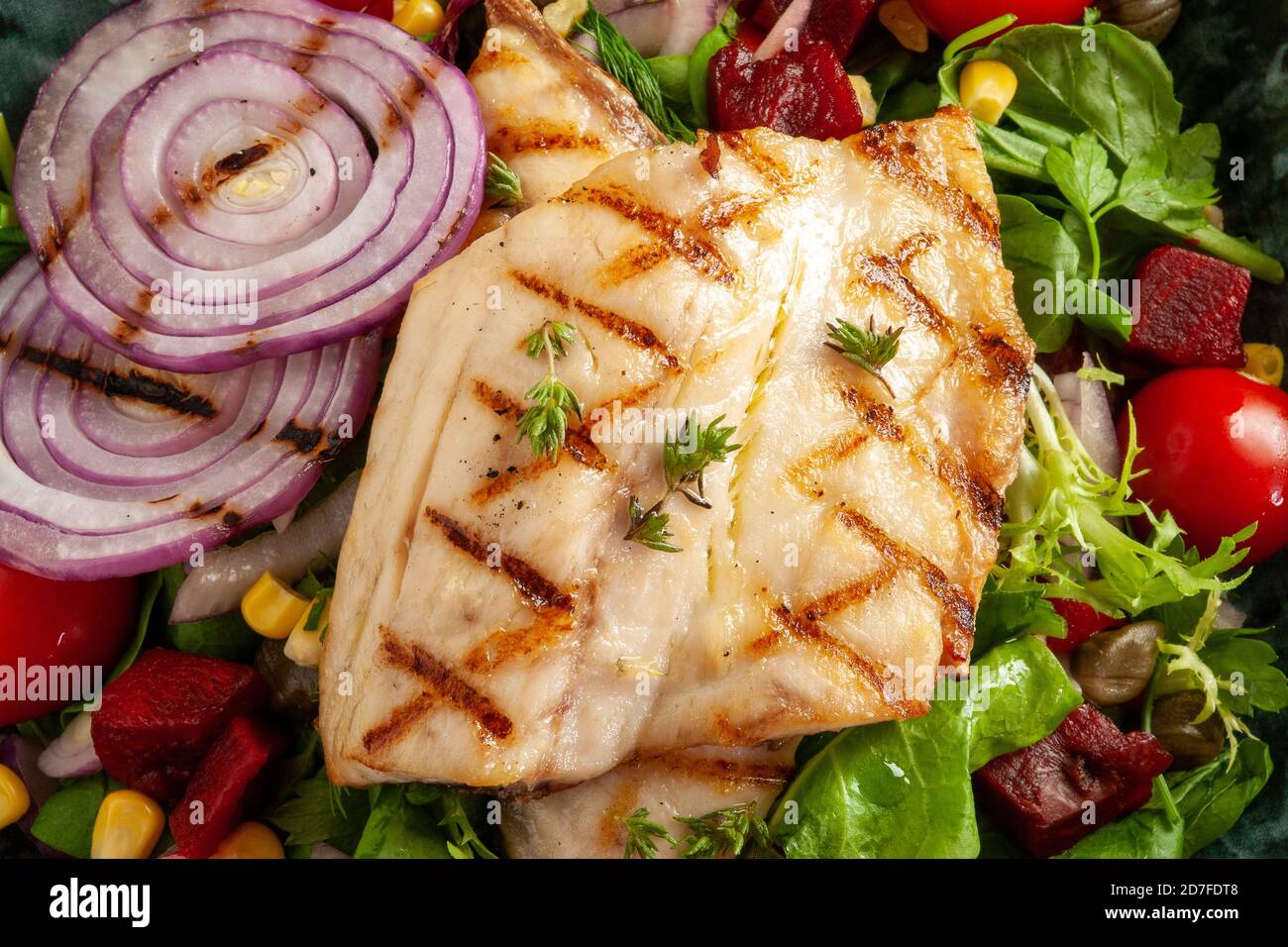 Tasty fish salad close up photo Stock Photo