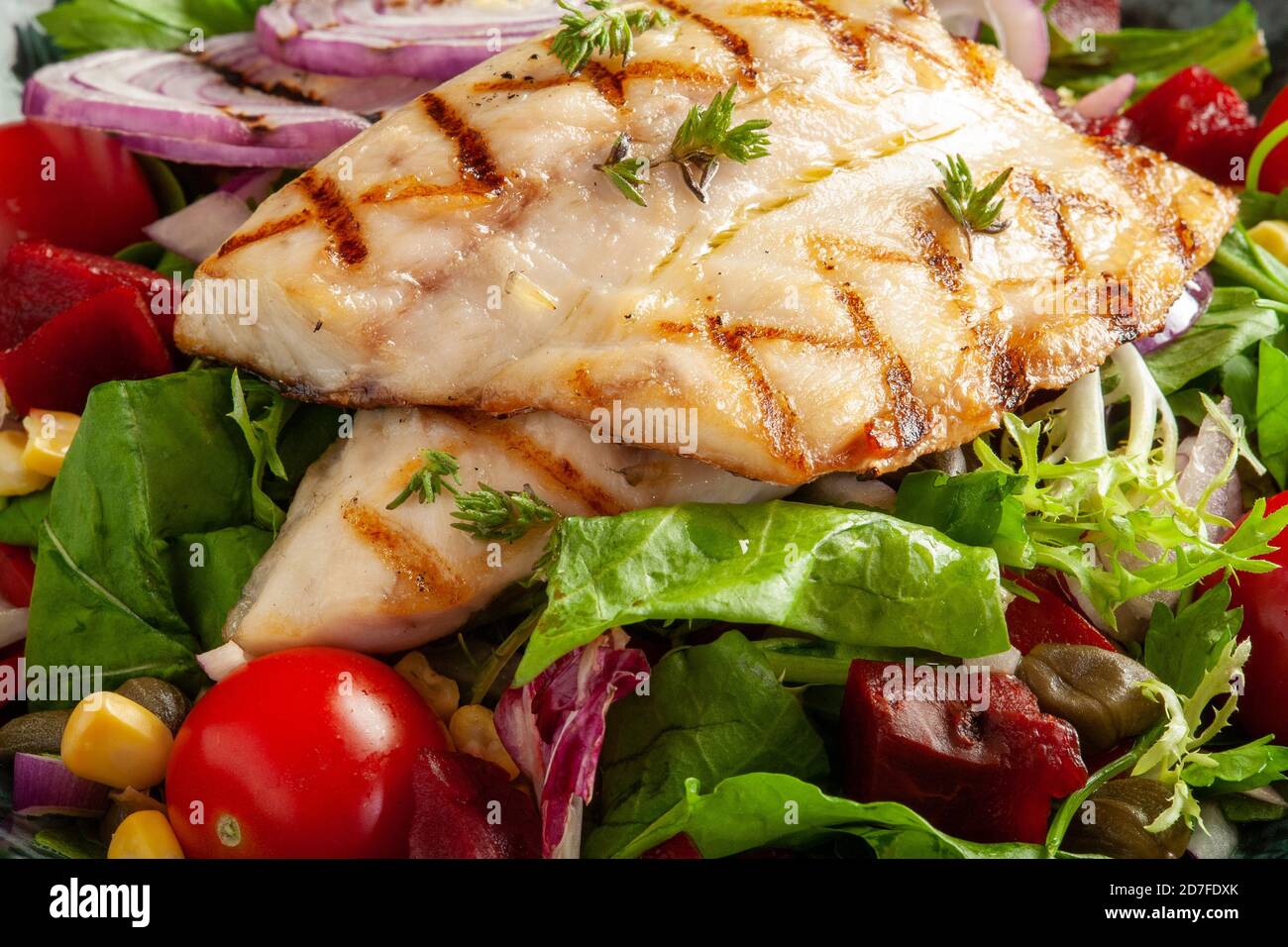 Tasty fish salad close up photo Stock Photo