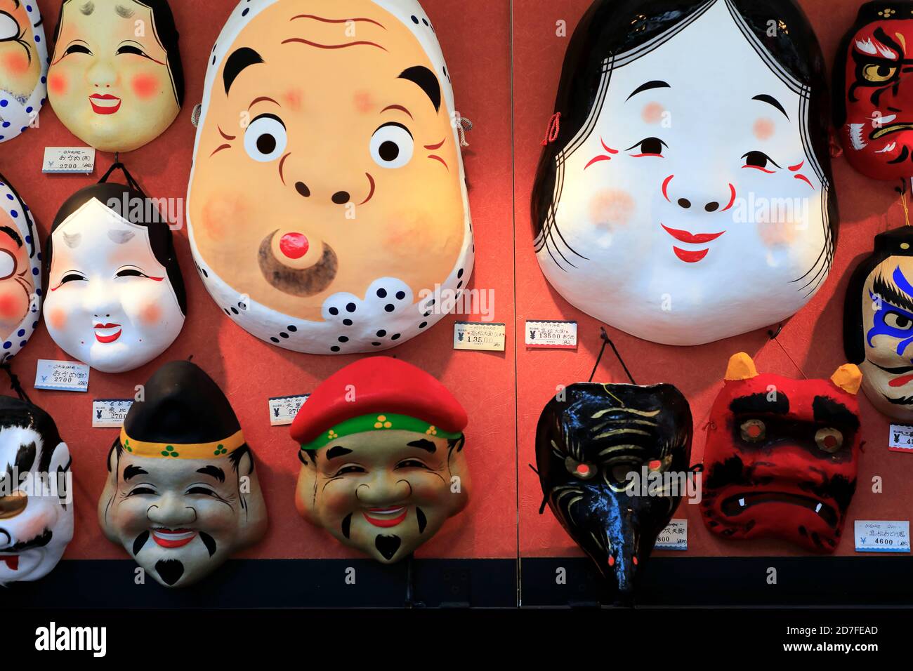 Traditional Japanese theater masks for sale as souvenir in a shop in