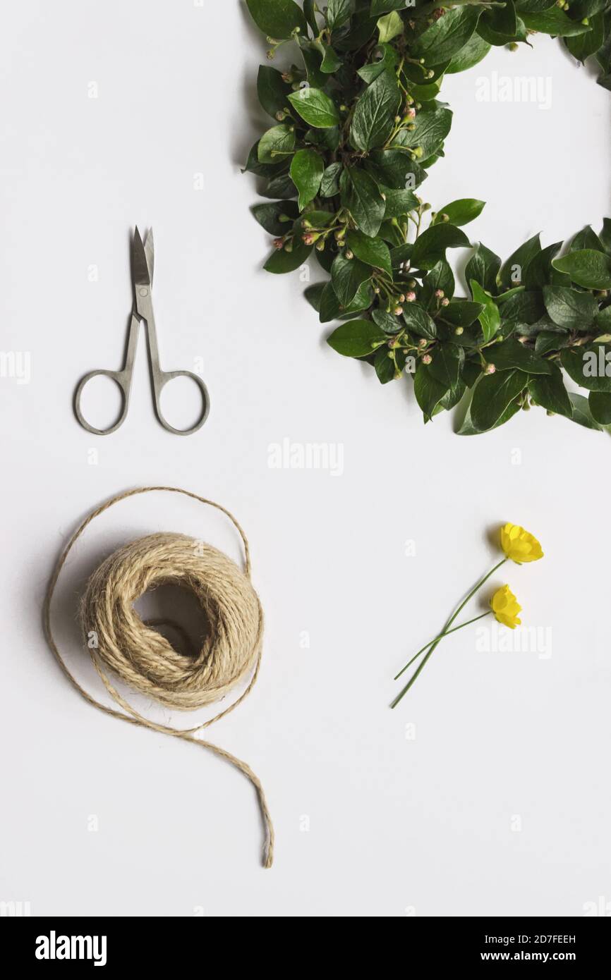 DIY midsummer flower wreath flat lay on white background Stock Photo