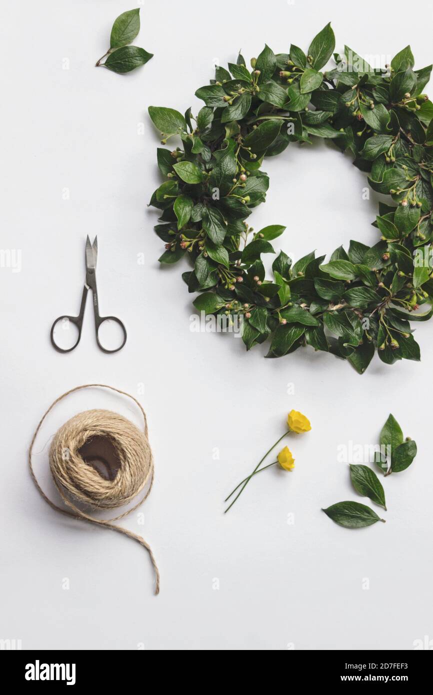 DIY midsummer flower wreath flat lay on white background Stock Photo