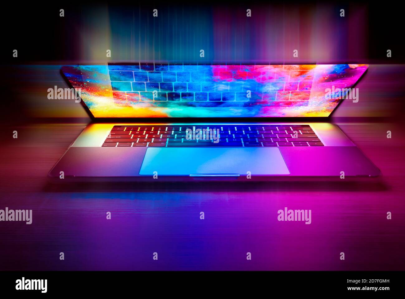 Color Emitting From Laptop Notebook Computer Creative Design Stock Photo