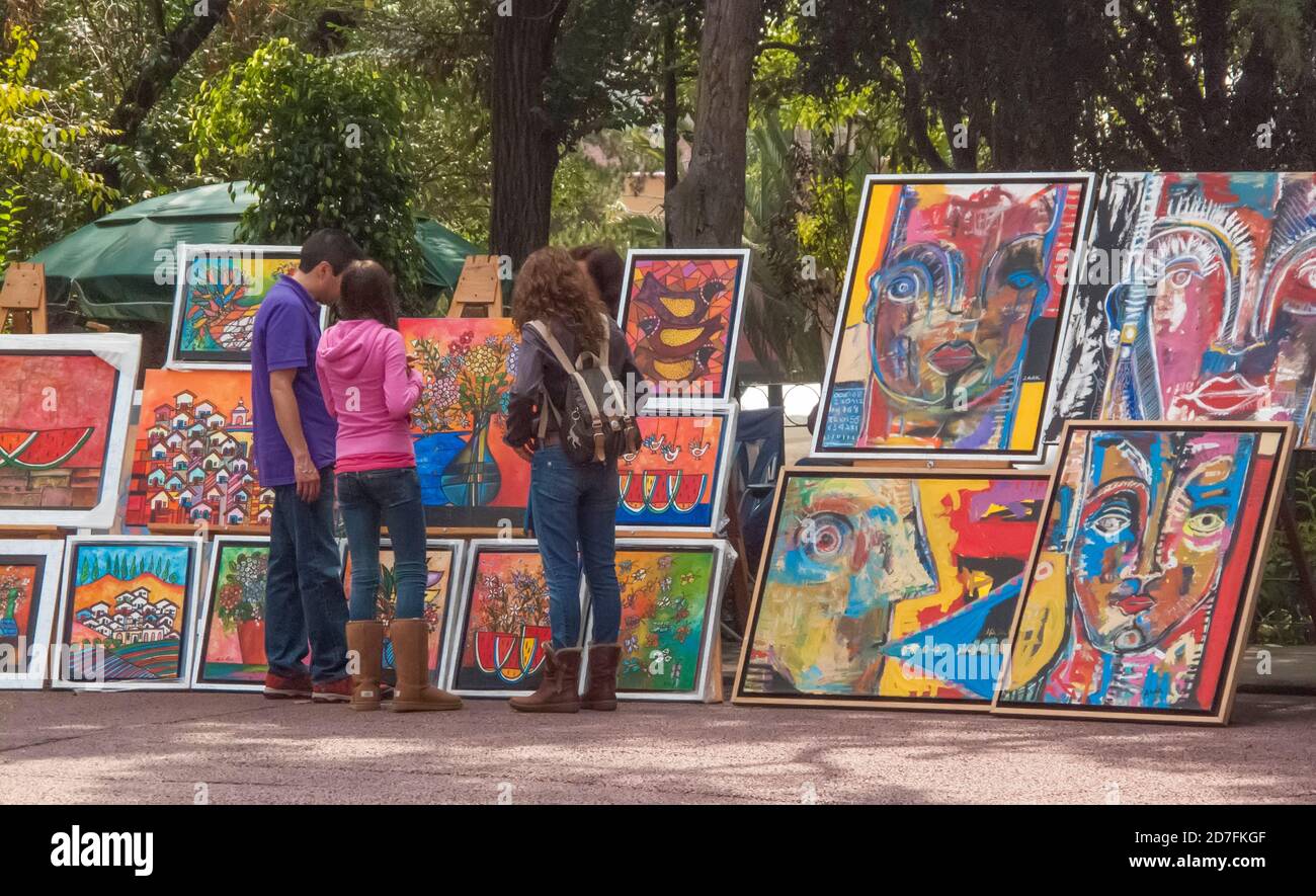 Buying paintings in San Angel, Mexico City, Mexico Stock Photo