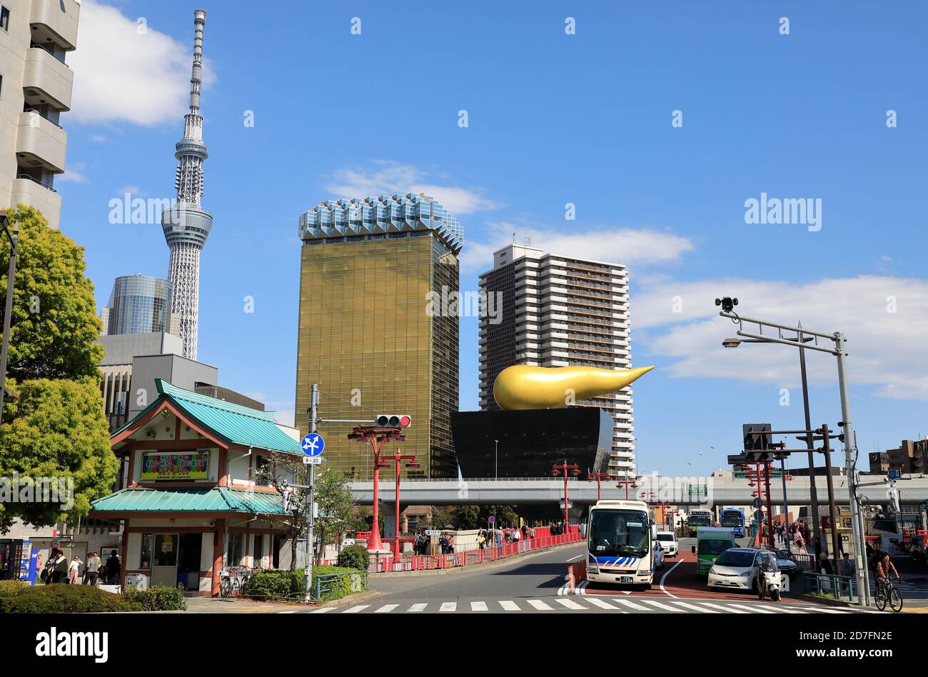Tokyo Skytree and Asahi Breweries headquarters building with the 'Asahi Flame' on top of Asahi Beer Hall designed by Philippe Starck.Sumida City.Tokyo.Japan Stock Photo