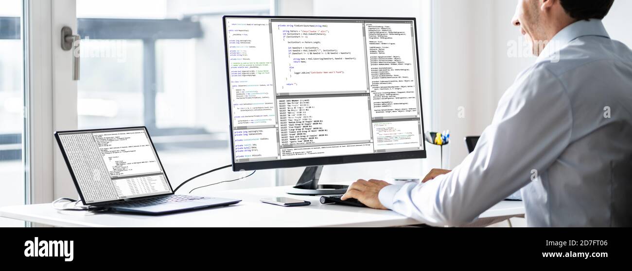 Software Developer Programmer Working On Computer In Office Stock Photo ...