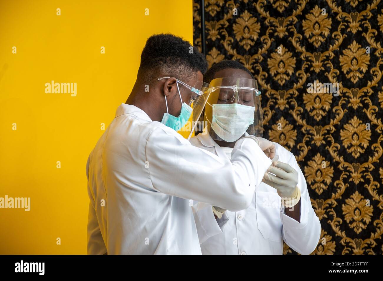 african medical persons in lab coats carrying out a study and tests Stock Photo