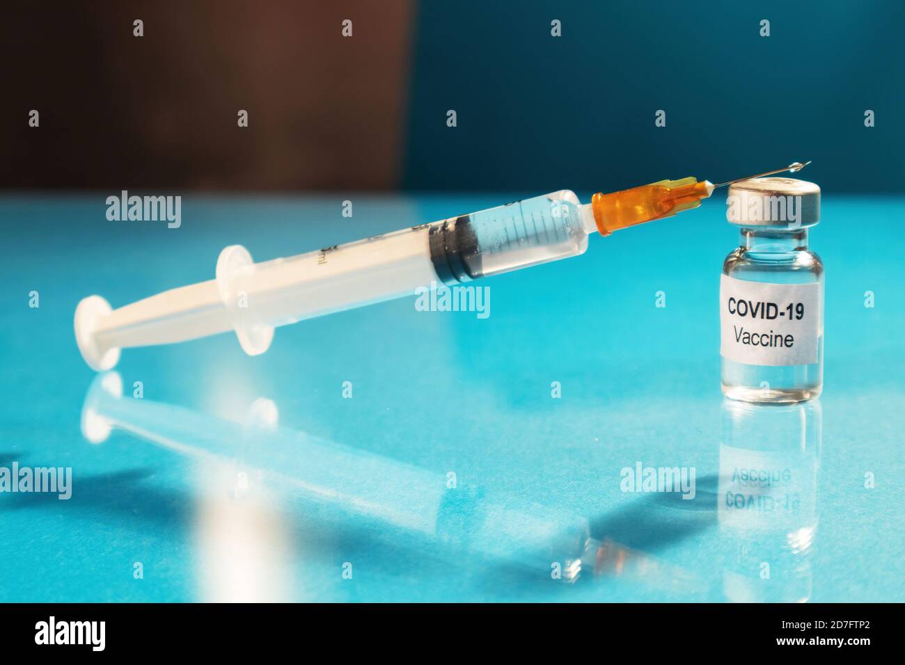 Coronavirus vaccine vial and syringe needle ready for injection Stock ...