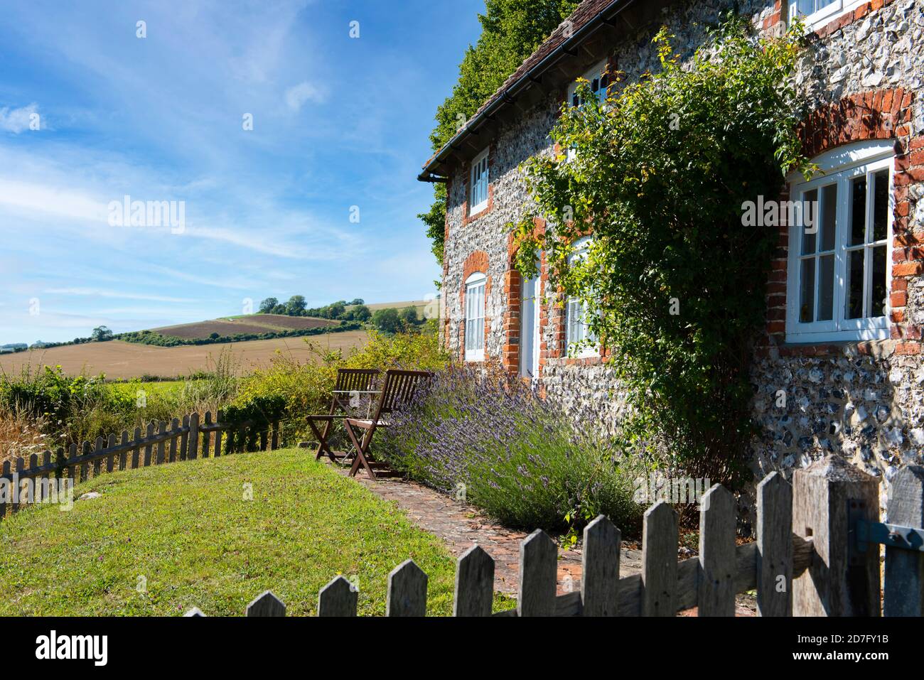 A flint cottage in the village of East Dean at the foot of the South