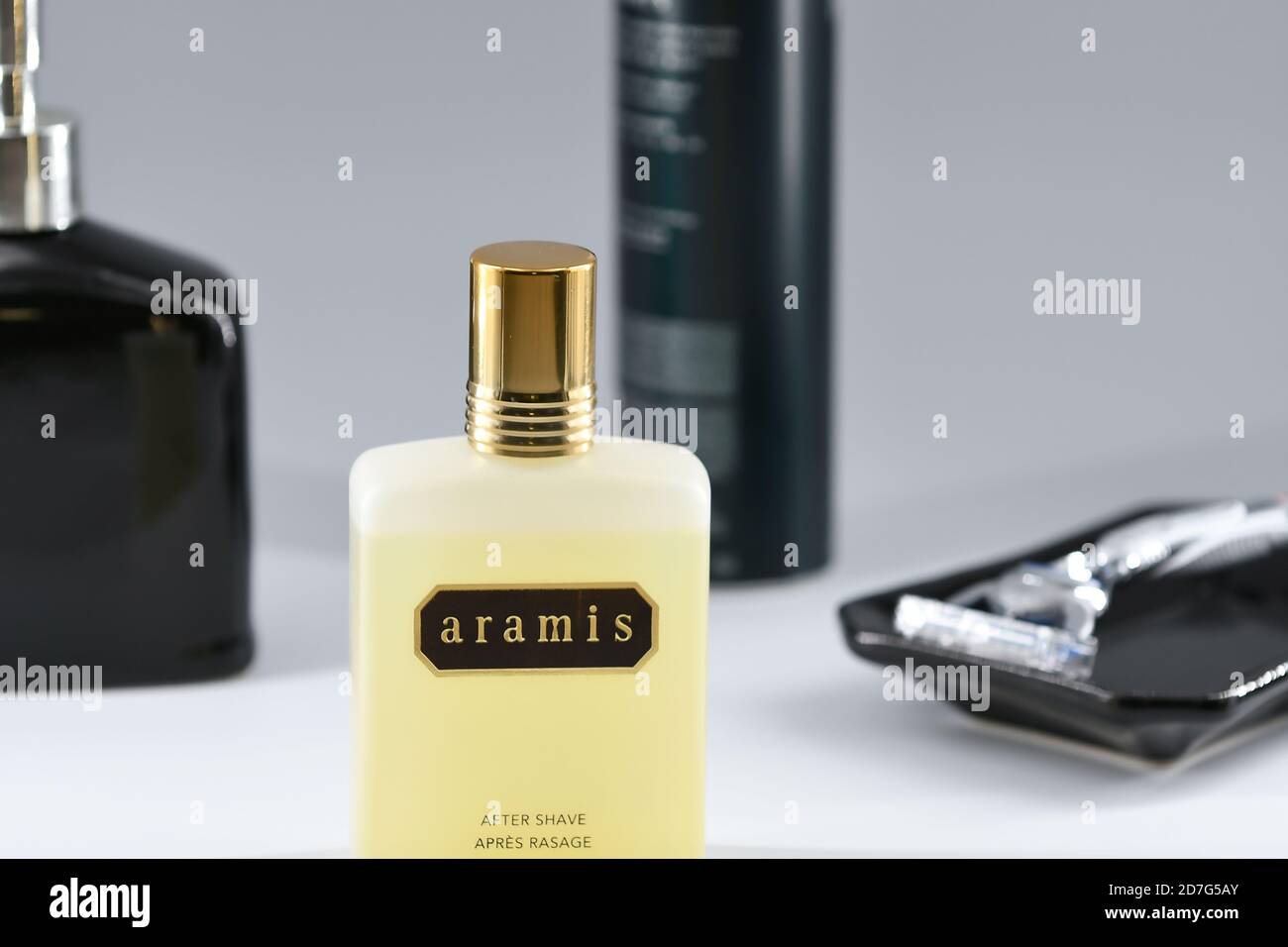 After Shave cologne shot in studio white background with accompanying items  Stock Photo - Alamy