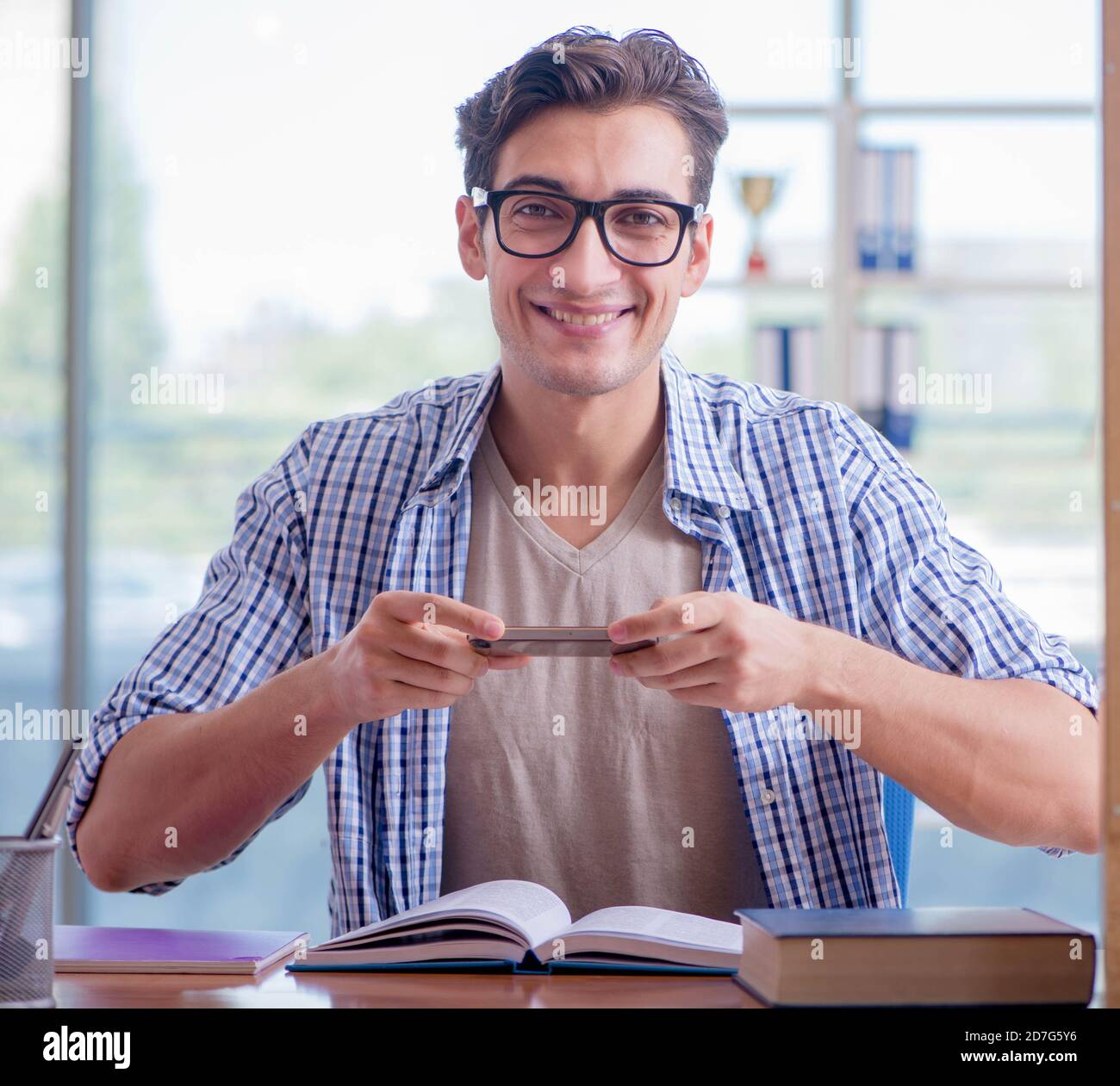 The student studying at home preparing for exam Stock Photo - Alamy