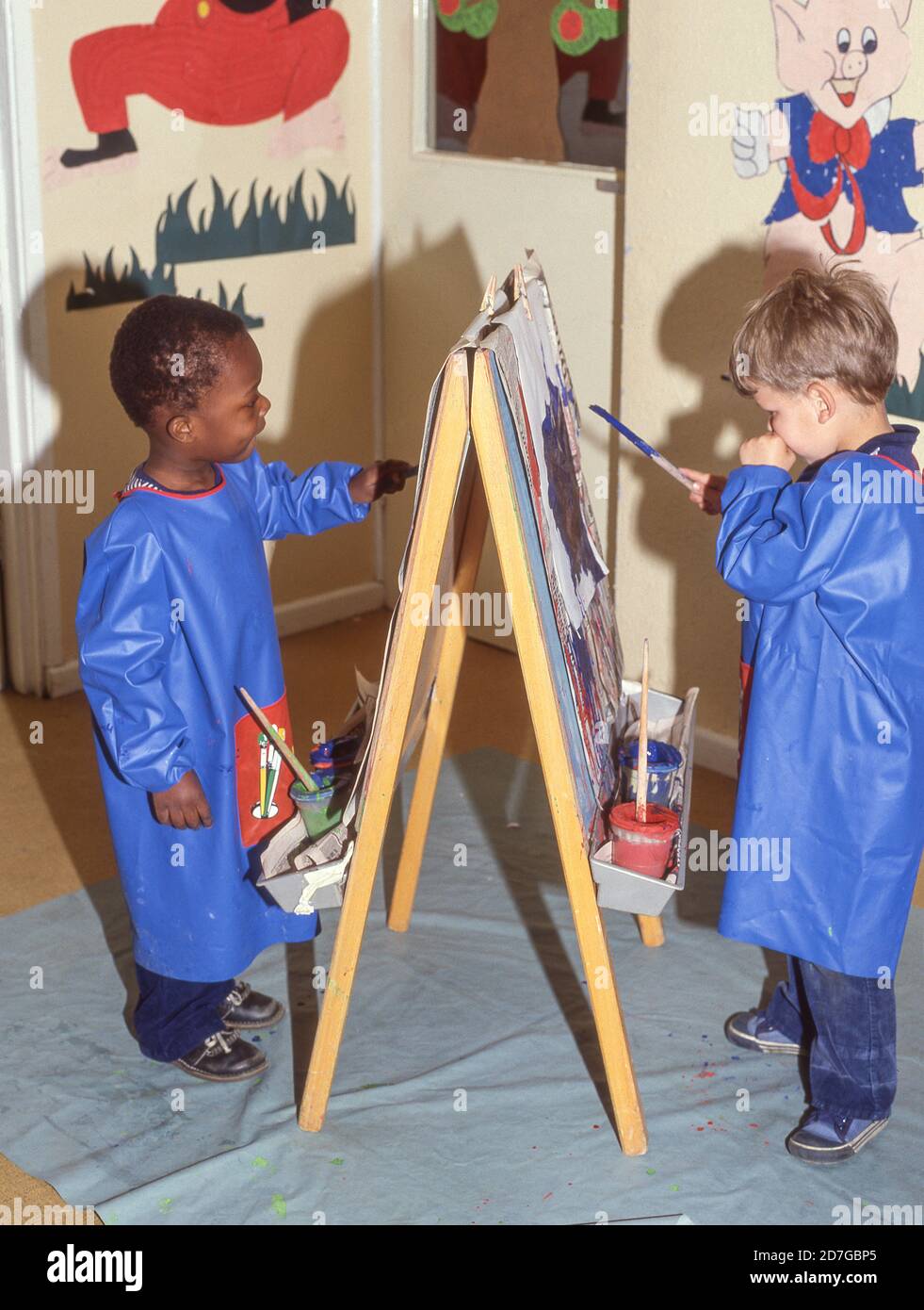 Children playing holiday painting hi-res stock photography and images ...