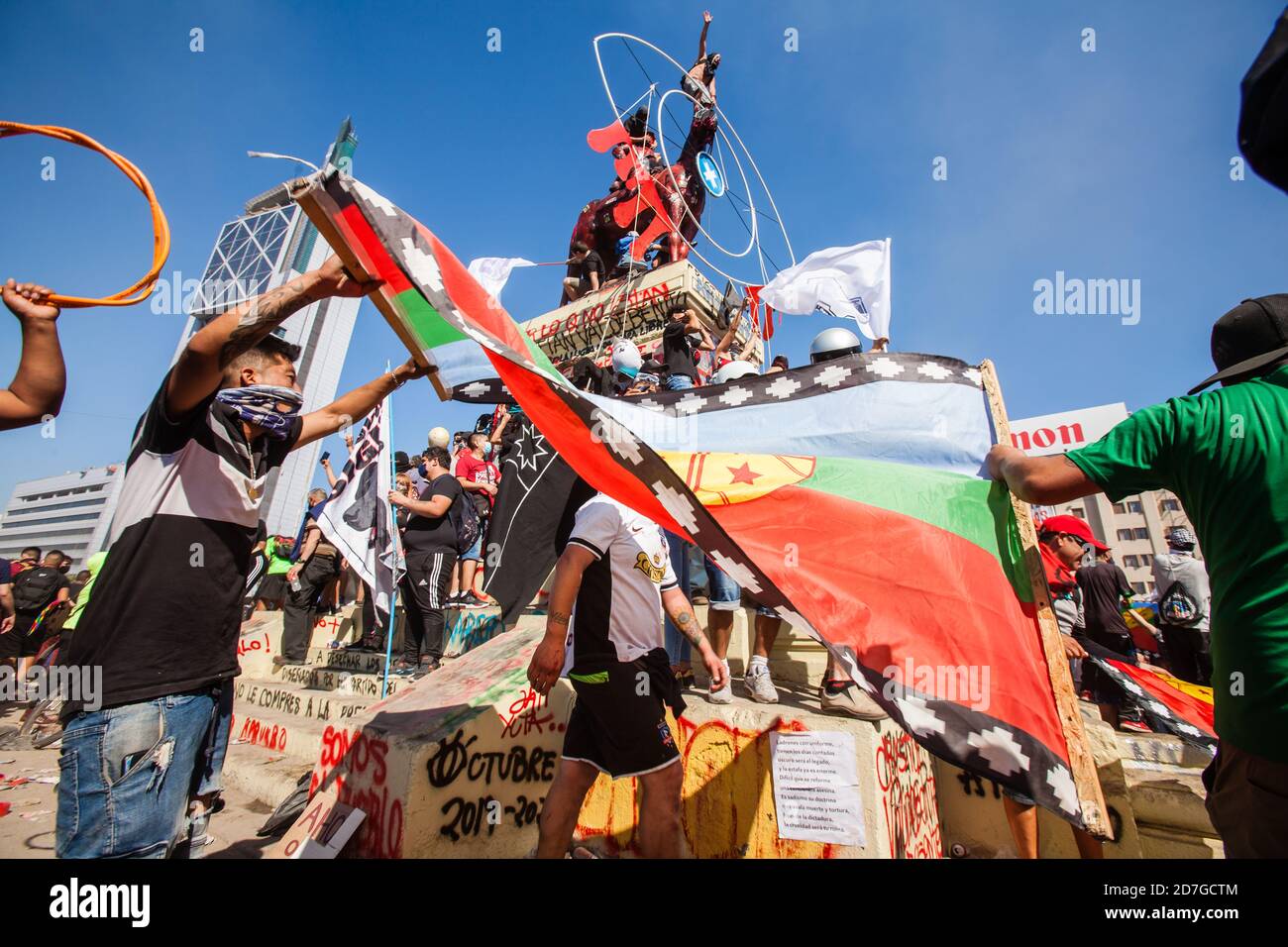 SANTIAGO, CHILEOCTOBER 18, 2020 Demonstrators wave Chilean and