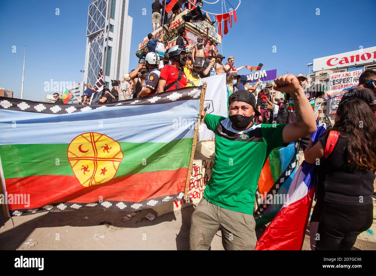 SANTIAGO, CHILEOCTOBER 18, 2020 Demonstrators wave Chilean and